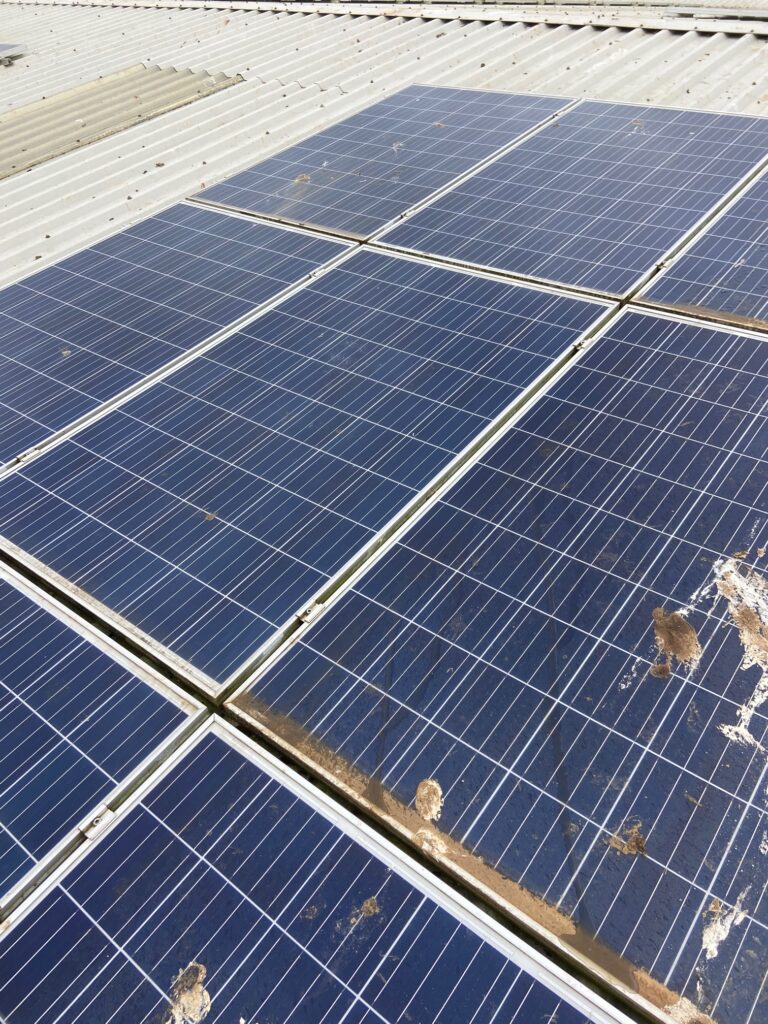 one clean vs on dirty solar panel