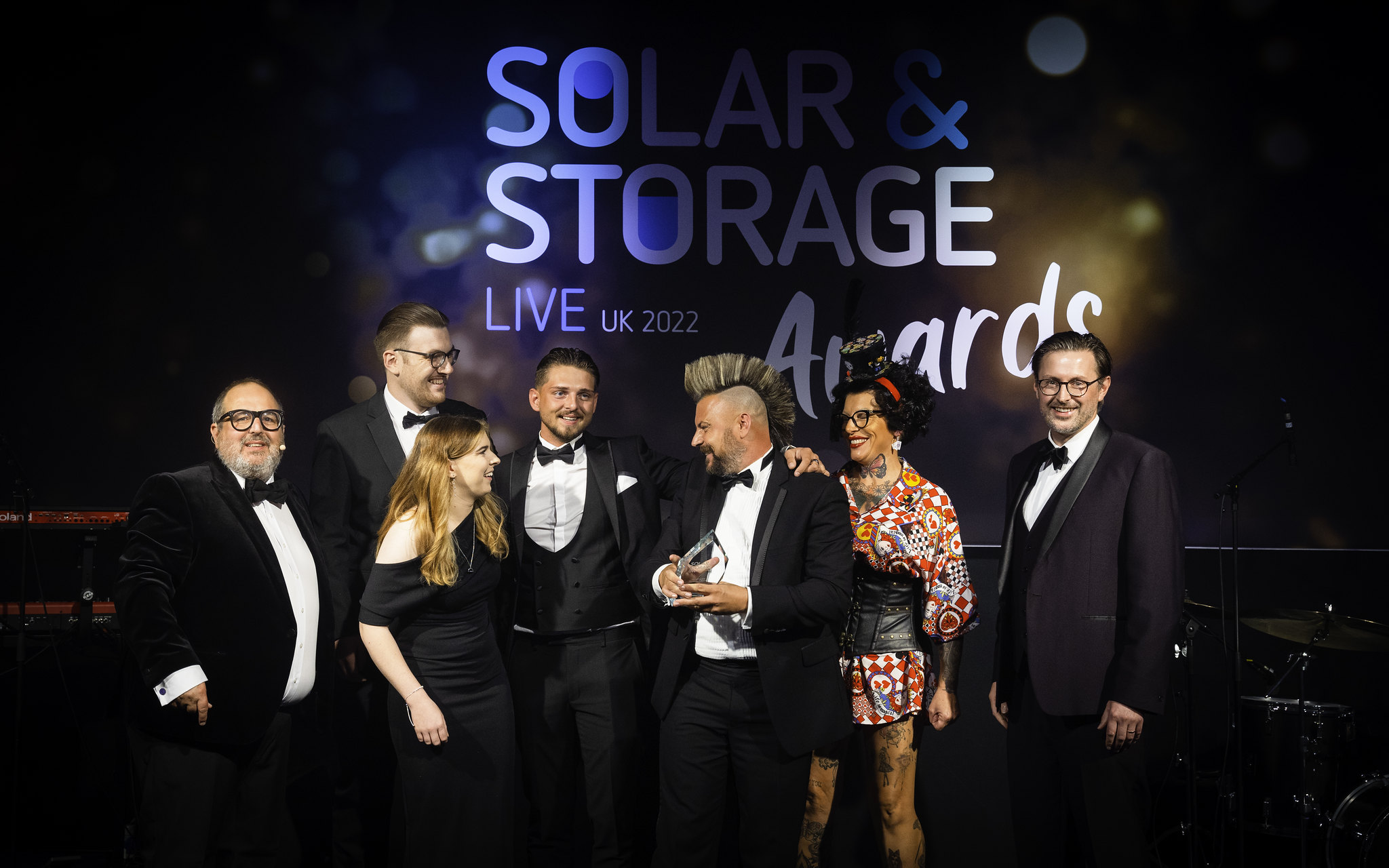 Clean Solar Solutions receiving an award on stage